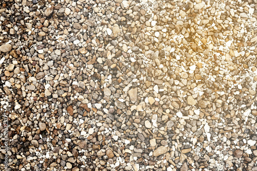 Abstract texture of white-gray gravel and crushed stone