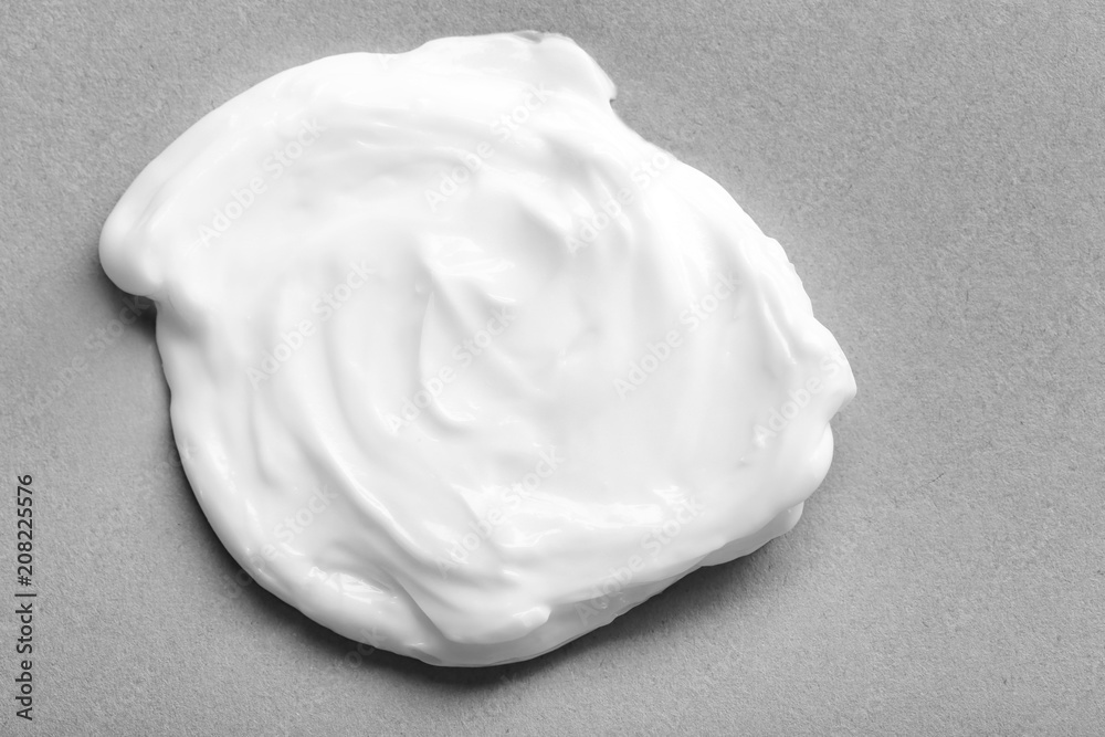 Sample of cream on gray background. Skin care cosmetics Sample of cream on gray background. Skin care cosmetics
