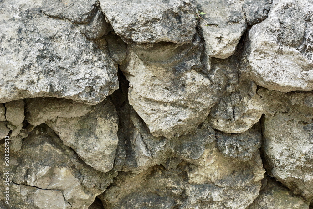 masonry stone wall of large stone limestone