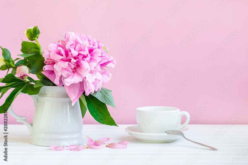 A cup of tea and peonies A cup of tea and peonies