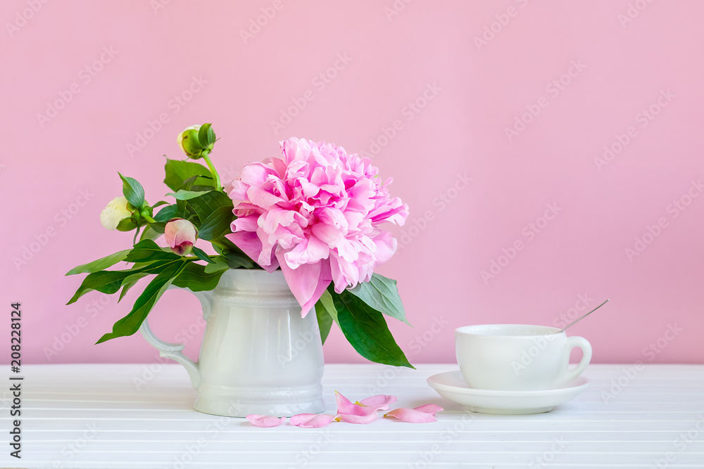 A cup of tea and peonies A cup of tea and peonies