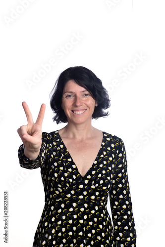 woman with victory sign on white © curto