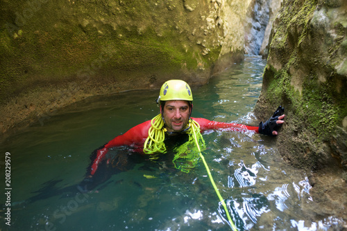 Canyoning in Gorgonchon Canyon, Spain.