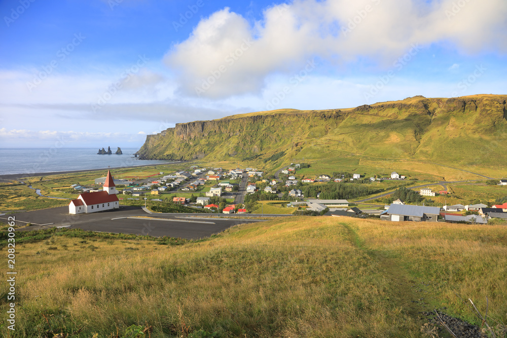 The village of Vík in Iceland The village of Vík in Iceland