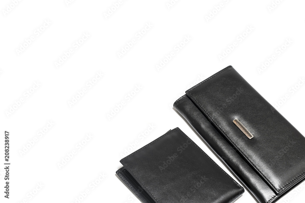Man's and woman's black, leather wallet isolated on white background Man's and woman's black, leather wallet isolated on white background