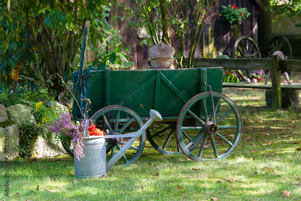 Vintage hand cart in a garden