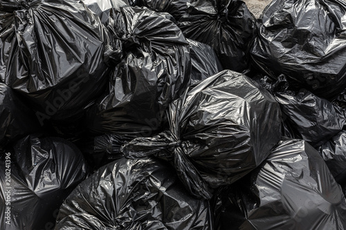 Background garbage bag black bin waste, Garbage dump, Bin,Trash, Garbage, Rubbish, Plastic Bags pile junk garbage Trash texture, Background waste plastic bin bag.