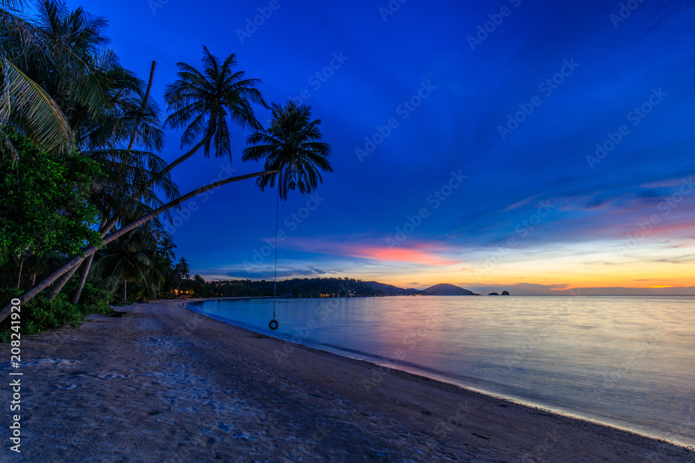 Colorful sunset on tropical beach  in Koh  Mak island, Trat province, Thailand.