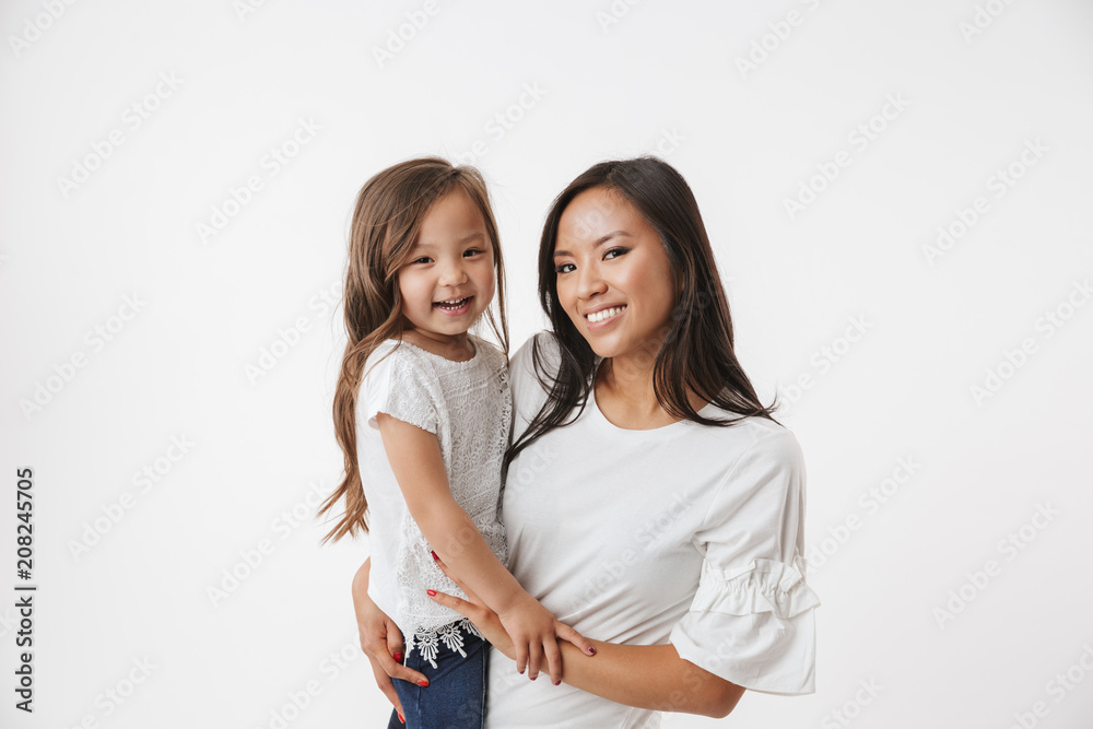 Happy young asian woman mother with her little daughter Happy young asian woman mother with her little daughter