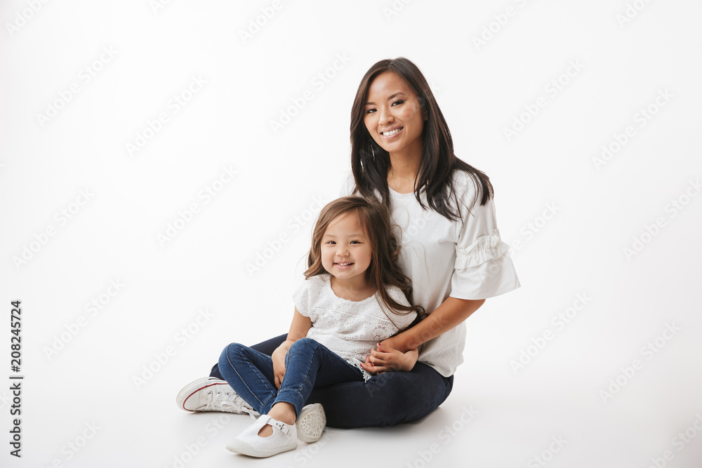 Cute young asian woman mother with her little daughter Cute young asian woman mother with her little daughter