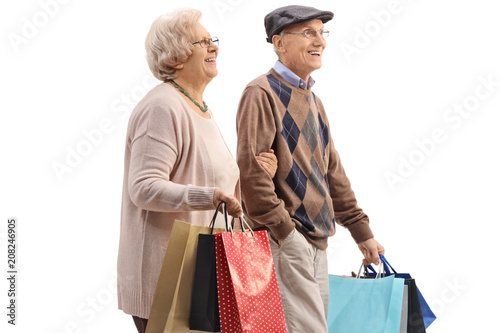 Senior couple with shopping bags