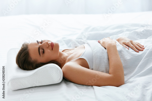 Healthy Sleep. Woman Sleeping On White Orthopedic Pillow