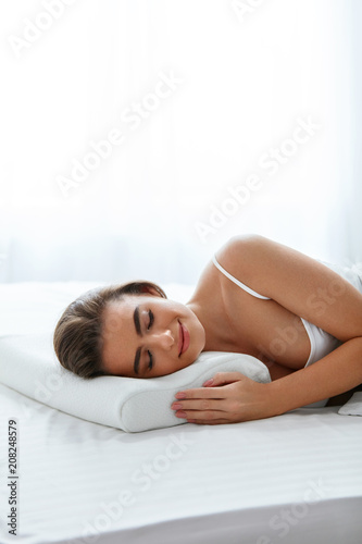 Healthy Sleep. Woman Sleeping On White Orthopedic Pillow