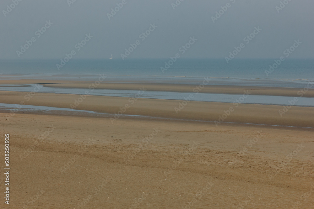 scenic shot of sandy seashore on cloudy day, Bray Dunes, France