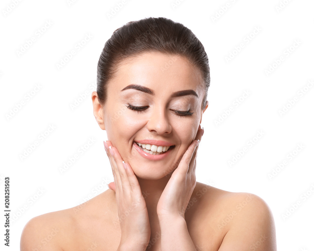 Beautiful young woman with silky skin after spa treatment on white background Beautiful young woman with silky skin after spa treatment on white background