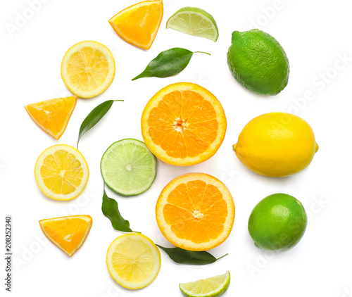 Composition with sliced citrus fruits on white background