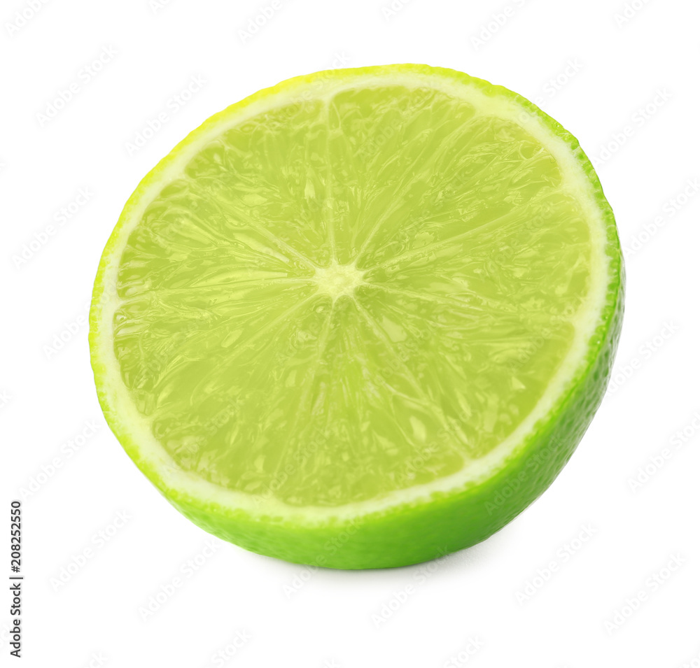 Half of ripe lime on white background
