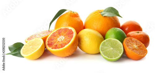 Fototapeta Naklejka Na Ścianę i Meble -  Different tasty citrus fruits on white background