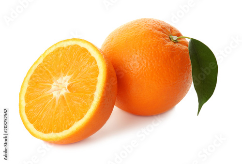 Tasty ripe oranges on white background