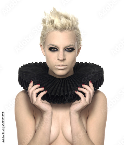 portrait of a woman with blonde short hair smokey eyes and elizabethan collar