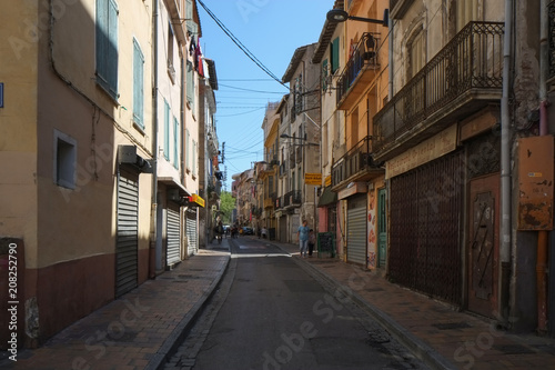 Fototapeta Naklejka Na Ścianę i Meble -  A street in Arab quarter of Perpignan in the center of the city, France