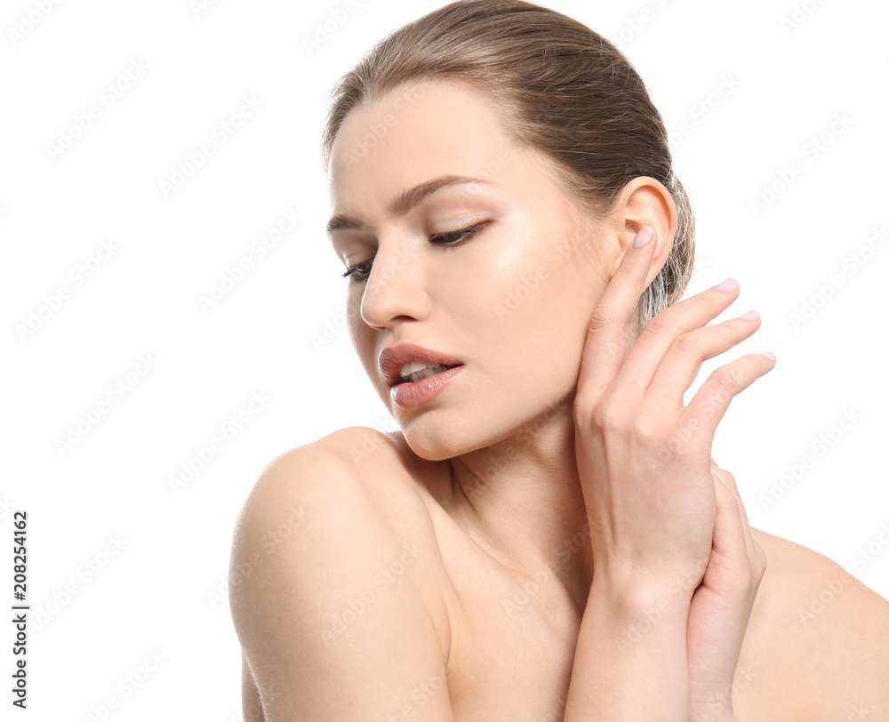 Beautiful young woman with natural makeup on white background