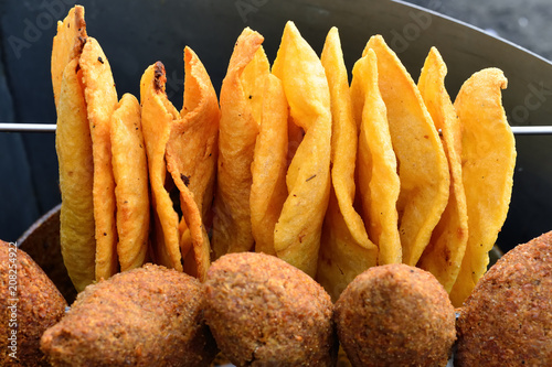 Traditional  plain snacks, fried on deep oil, for buying in streets in of Dominican Republic