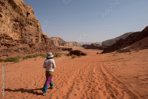 Woman trekking in the desert