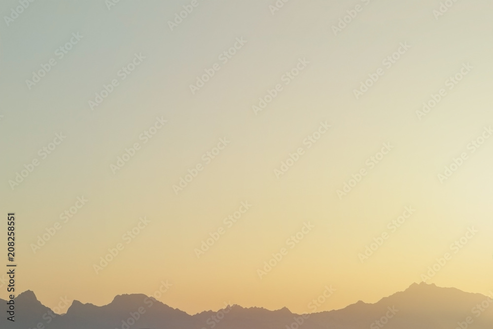 silhouette of red sea mountains on sunset