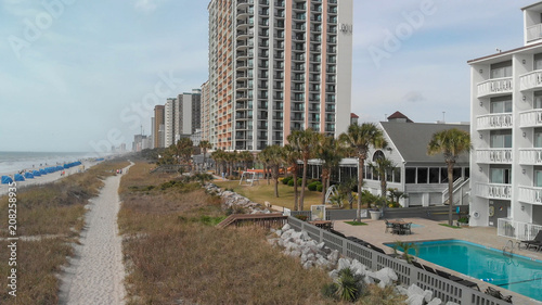 MYRTLE BEACH, SC - APRIL 6, 2018: City buildings and coastline, aerial view. Myrtle Beach is a famous attraction for tourists in South Carolina