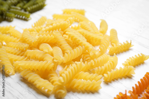 Uncooked pasta on light background