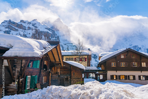View of snowy Murren Village in sunny day with the beautiful high mountain in the background of snowy Murren