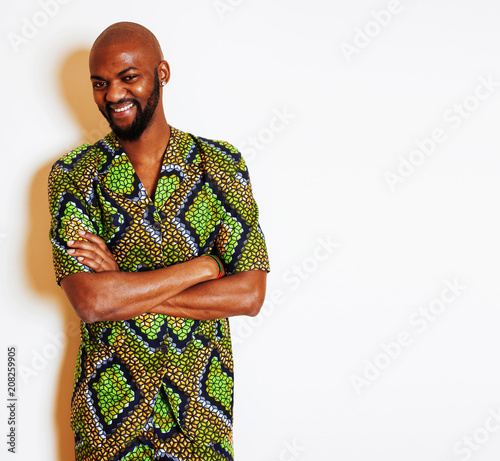 portrait of young handsome african man wearing bright green nati photo