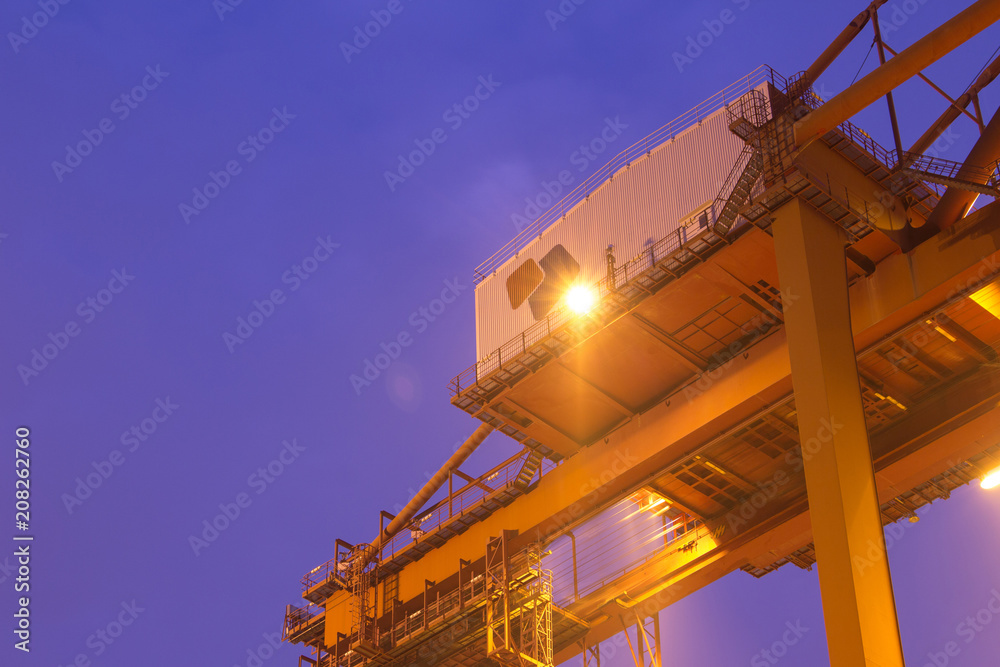 Container loading in a Cargo freight ship with industrial crane. Container ship in import and export business logistic company. Industry and Transportation concept. Container loading in a Cargo freight ship with industrial crane. Container ship in import and export business logistic company. Industry and Transportation concept.