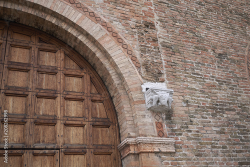 Treviso, Italy - May 29, 2018: Entrance door of Palazzo dei Trecento photo