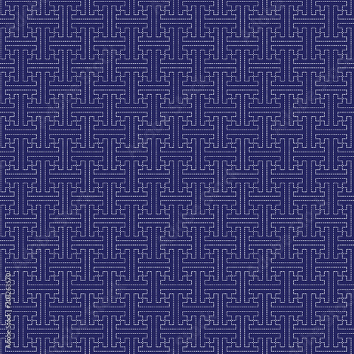 Japanese sashiko ornament. Asian embroidery motifs. Abstract seamless patterns. White stitches on the indigo blue background. For handicraft or decoration.