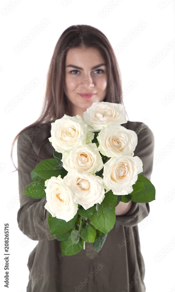 Close up cropped portrait of charming cheerful hispanic woman with natural makeup having bouquet of white roses in hands looking at camera isolated on white background. Birthday girl with flowers. Close up cropped portrait of charming cheerful hispanic woman with natural makeup having bouquet of white roses in hands looking at camera isolated on white background. Birthday girl with flowers.