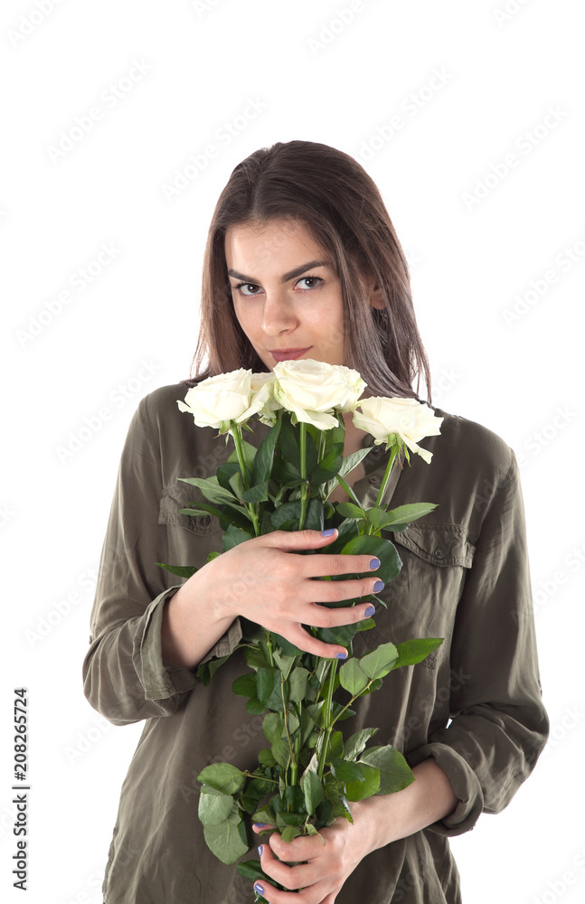 Close up cropped portrait of charming cheerful hispanic woman with natural makeup having bouquet of white roses in hands looking at camera isolated on white background. Birthday girl with flowers. Close up cropped portrait of charming cheerful hispanic woman with natural makeup having bouquet of white roses in hands looking at camera isolated on white background. Birthday girl with flowers.