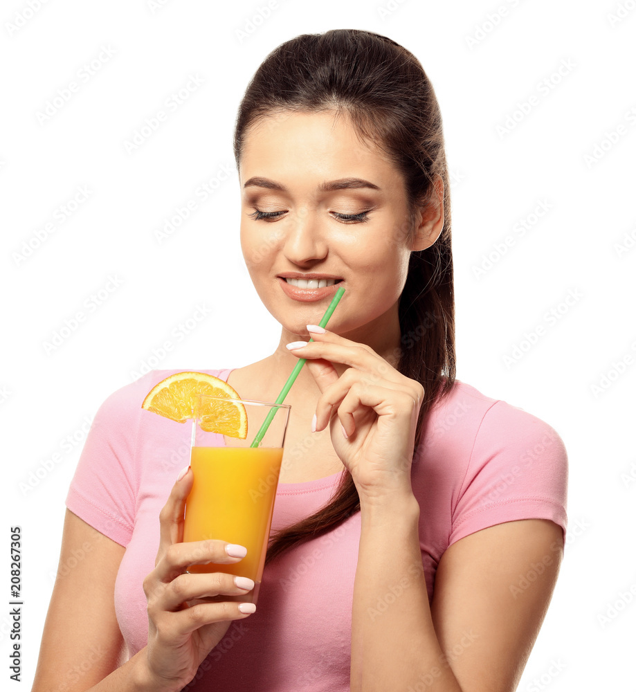 Beautiful young woman with glass of citrus juice on white background Beautiful young woman with glass of citrus juice on white background