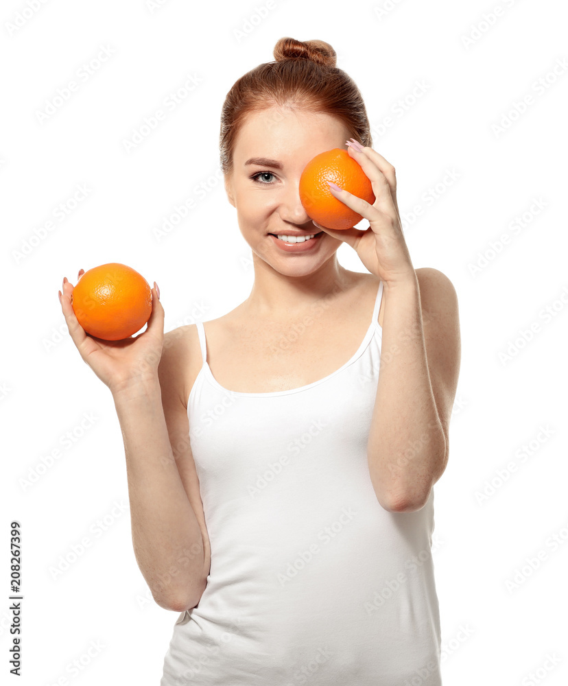 Beautiful young woman with citrus fruit on white background Beautiful young woman with citrus fruit on white background