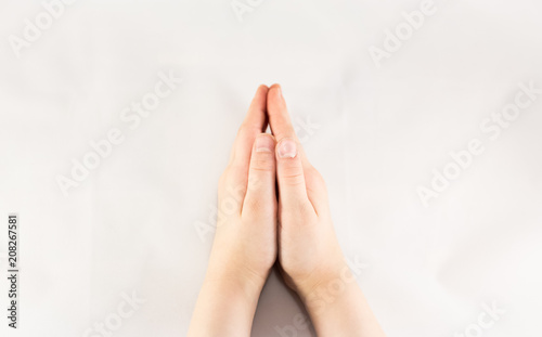 Praying child hands.