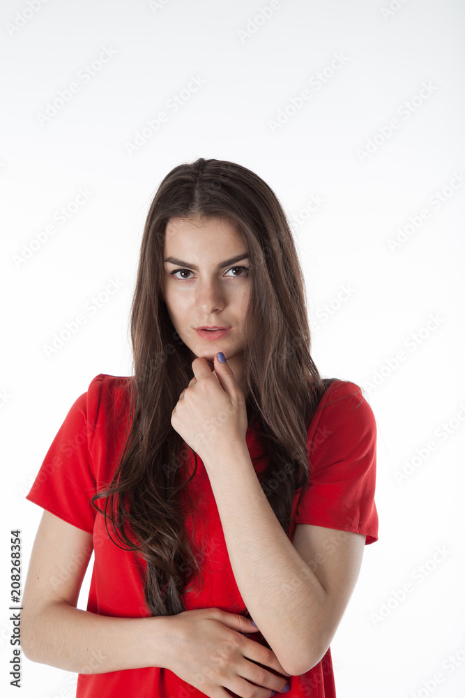 Young woman in red dress on white background. Young woman in red dress on white background.