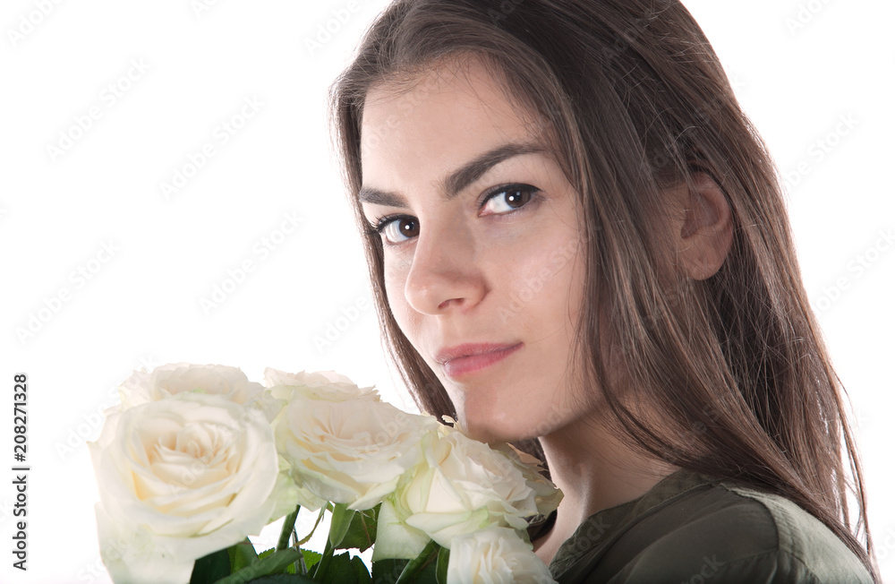 Close up cropped portrait of charming cheerful hispanic woman with natural makeup having bouquet of white roses in hands looking at camera isolated on white background. Close up cropped portrait of charming cheerful hispanic woman with natural makeup having bouquet of white roses in hands looking at camera isolated on white background.