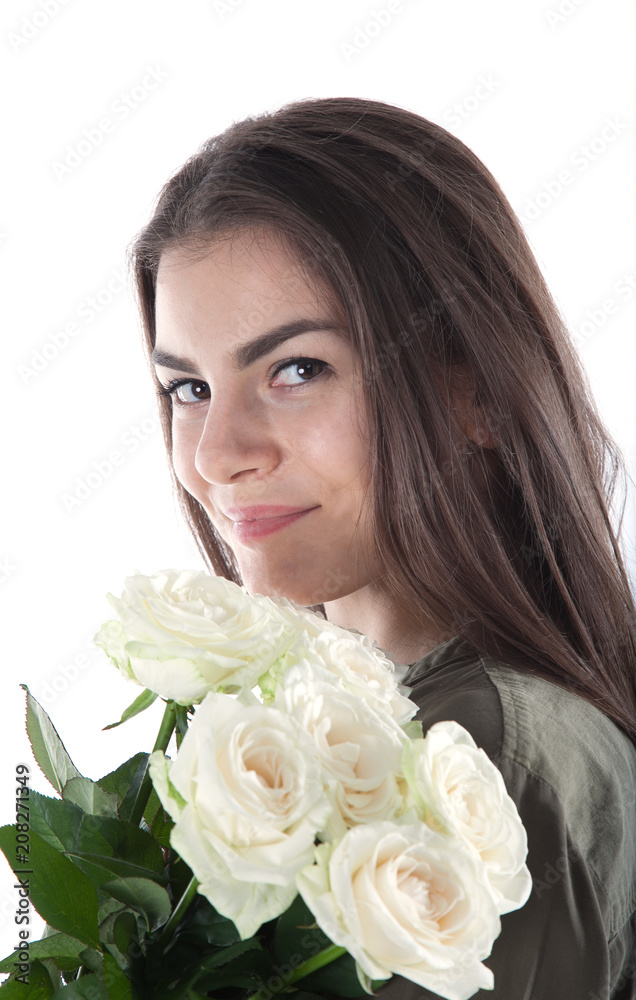 Close up cropped portrait of charming cheerful hispanic woman with natural makeup having bouquet of white roses in hands looking at camera isolated on white background. Close up cropped portrait of charming cheerful hispanic woman with natural makeup having bouquet of white roses in hands looking at camera isolated on white background.