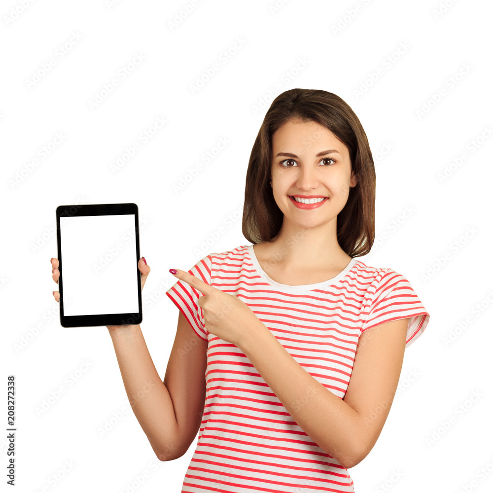 Portrait of a smiling attractive girl pointing finger at black screen tablet computer. emotional girl isolated on white background Portrait of a smiling attractive girl pointing finger at black screen tablet computer. emotional girl isolated on white background