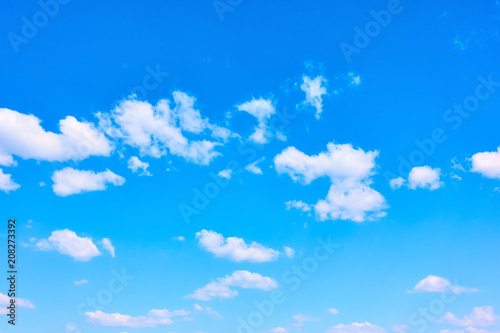 Blue sky with white light clouds