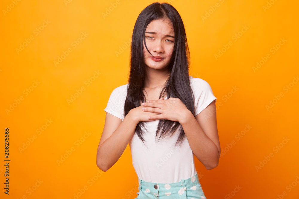Young Asian woman got chest pain. Young Asian woman got chest pain.