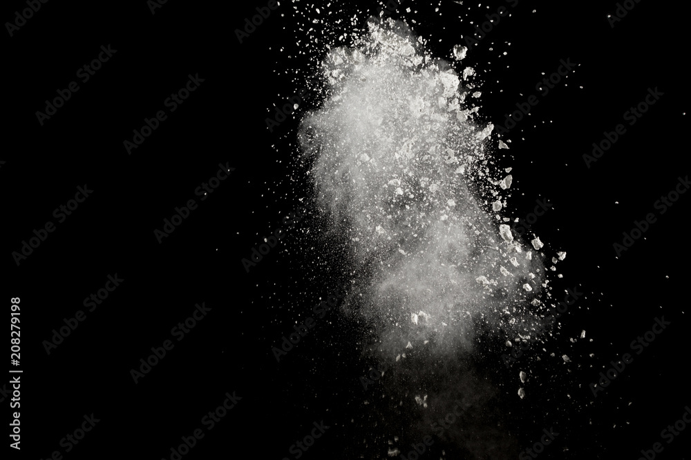 Bizarre forms of white powder explosion cloud against dark background. Launched white particle splash on black background. Bizarre forms of white powder explosion cloud against dark background. Launched white particle splash on black background.