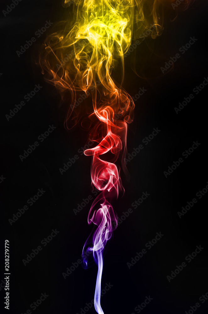 abstract fragment movement of colorful red blue and yellow gradient smoke on black background.