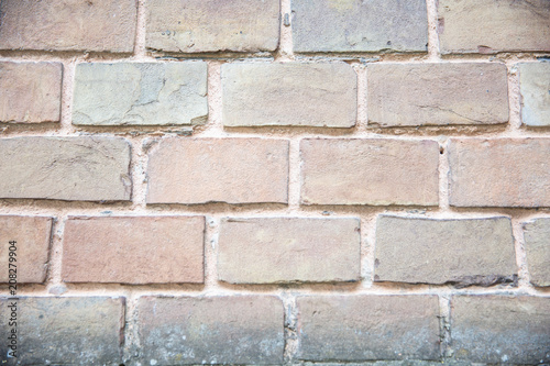 Grey brick wall texture background.